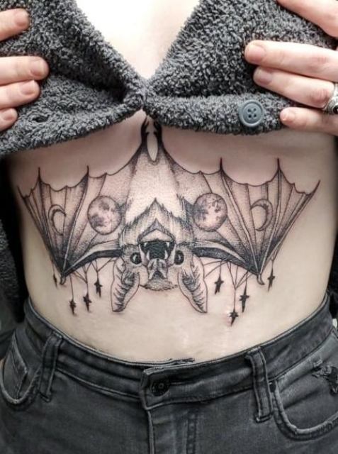 Attractive-Bat-Sternum-Tattoo 